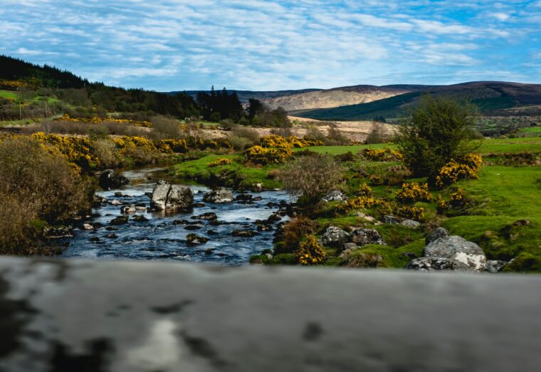 landscape view of wicklow mountains ireland, river and mountains
